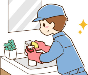 洗面所を清掃する男性