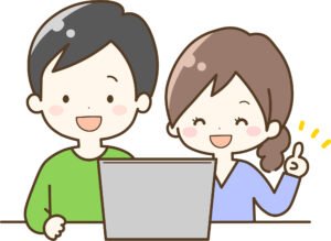 パソコンで調べる男女